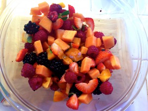 Rock Iguana Birthday fruit salad: papaya, persimmon, strawberry, blackberry and raspberry.